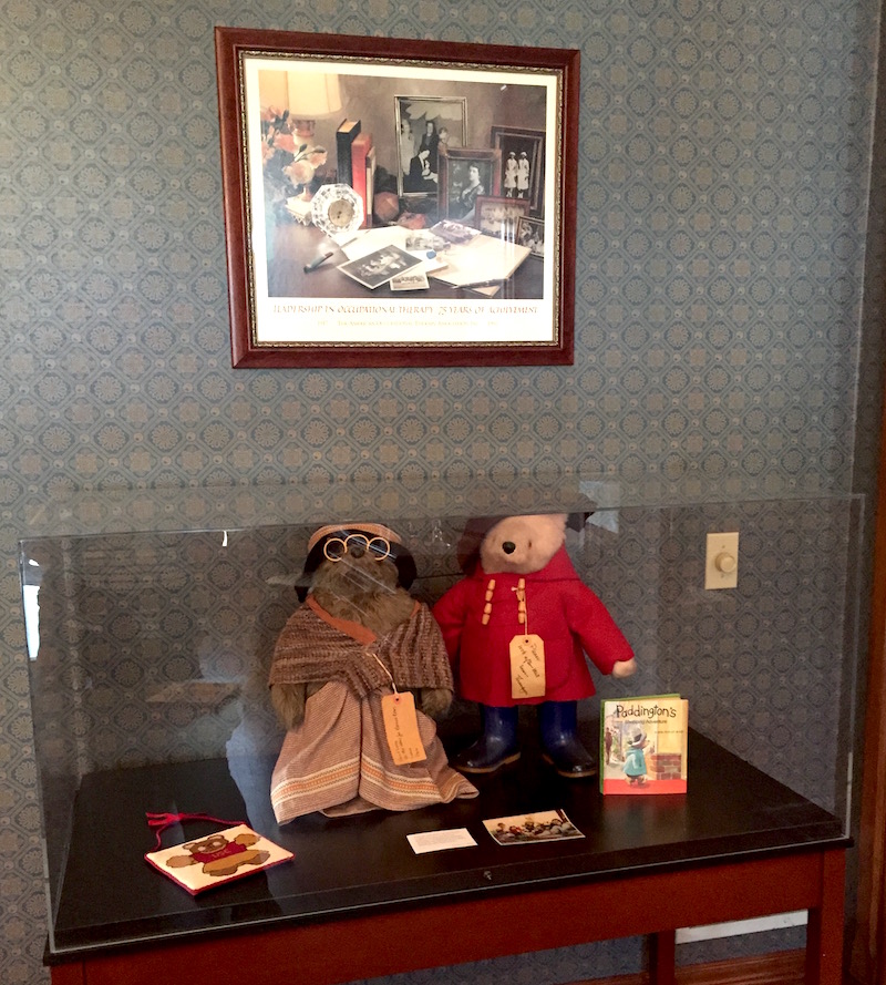 This display containing Paddington and Aunt Lucy represents the extensive bear collection of former Department Chairs Harriet Zlatohlavek and Mary Reilly.