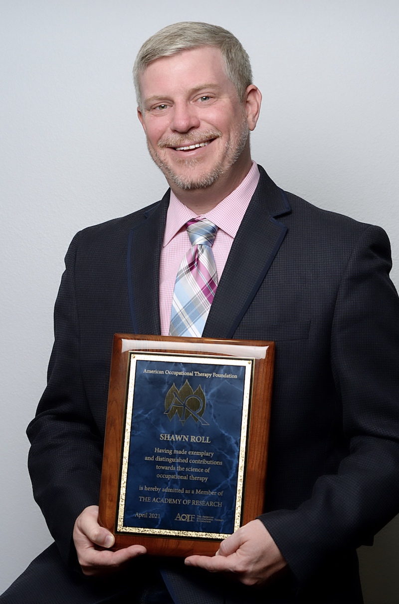 Dr. Roll Inducted into AOTF Academy of Research