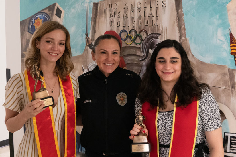 Riley McGuire, DPS Assistant Chief Alma Burke and Monica Caris pose after the two students were honored for their autism project. (Photo/Courtesy of Riley McGuire)