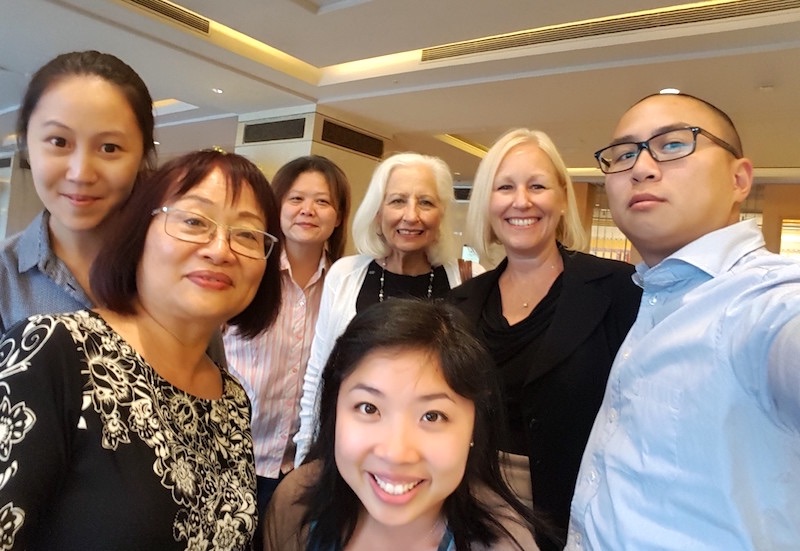 China Initiative members take a selfie after a debriefing meeting