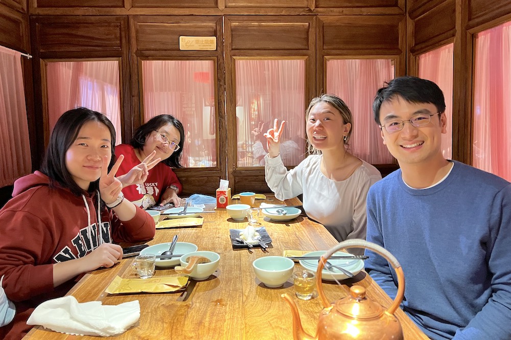 Luming Yang, OTD; Hui Wang, OTD; Tina Peng; and Liguo Qian, OTD enjoy a traditional Beijing meal.