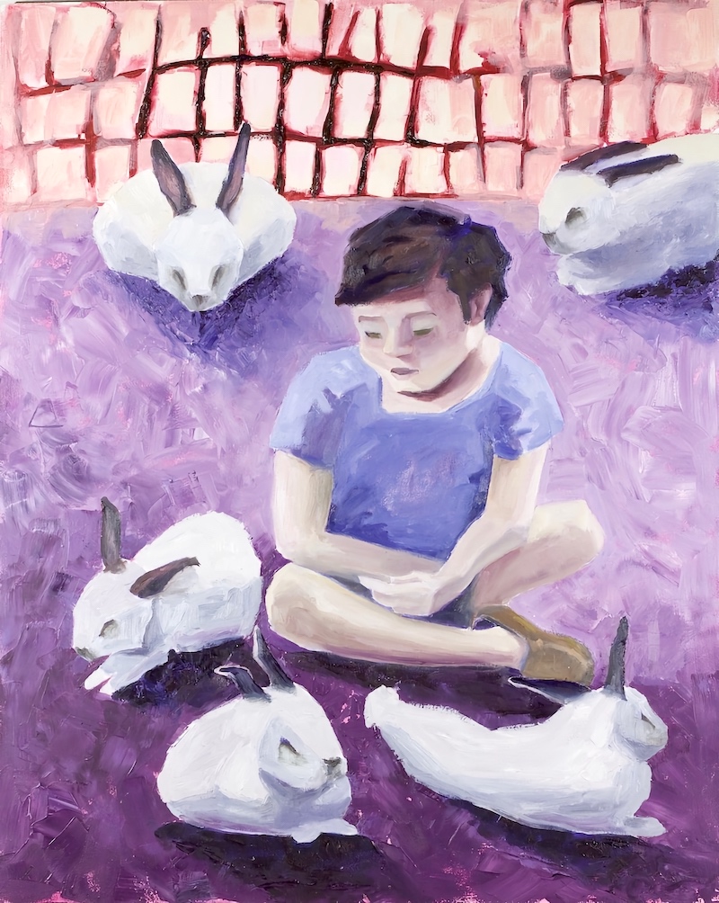 Child with rabbits