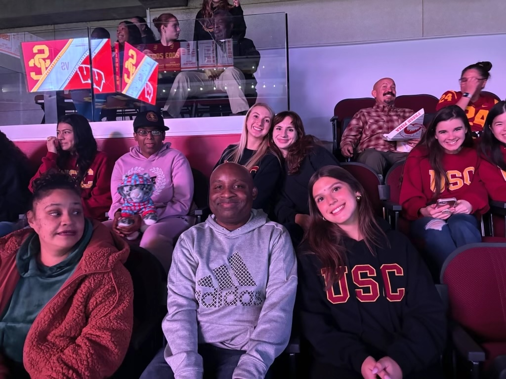 Best Buddies club watching a USC women's basketball game together