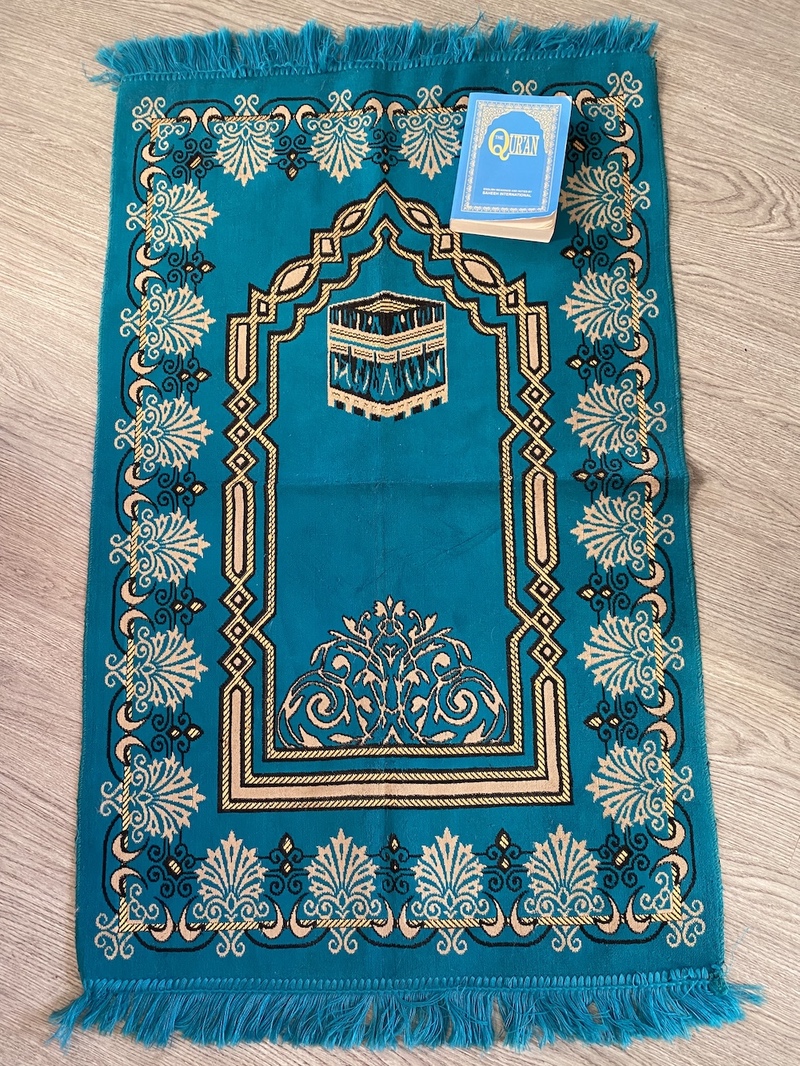 My prayer mat and Qur’an