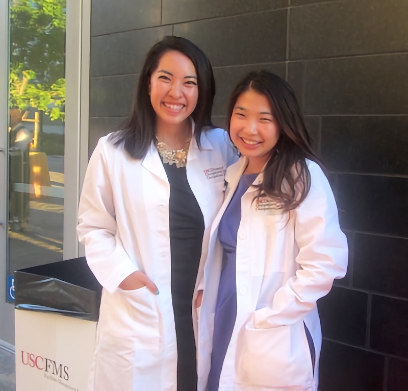 Author and friend at white coat ceremony