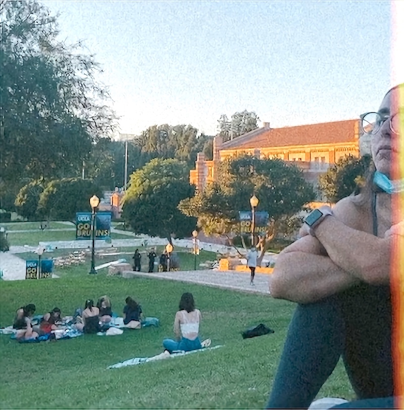 My friend and fellow ambassador Silvia is just out of frame, sitting on the grassy knoll next to Janss Steps at UCLA